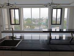 2 BEDROOM APARTMENT FOR RENT IN OYSTER COURT GULBERG 3 LAHORE