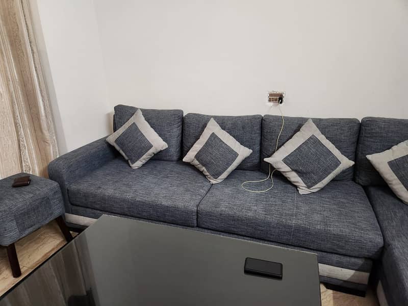 Slightly Used Sofa in New Condition Along with Table 1