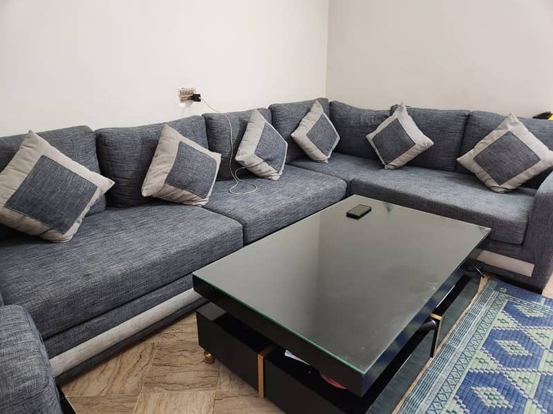 Slightly Used Sofa in New Condition Along with Table 4