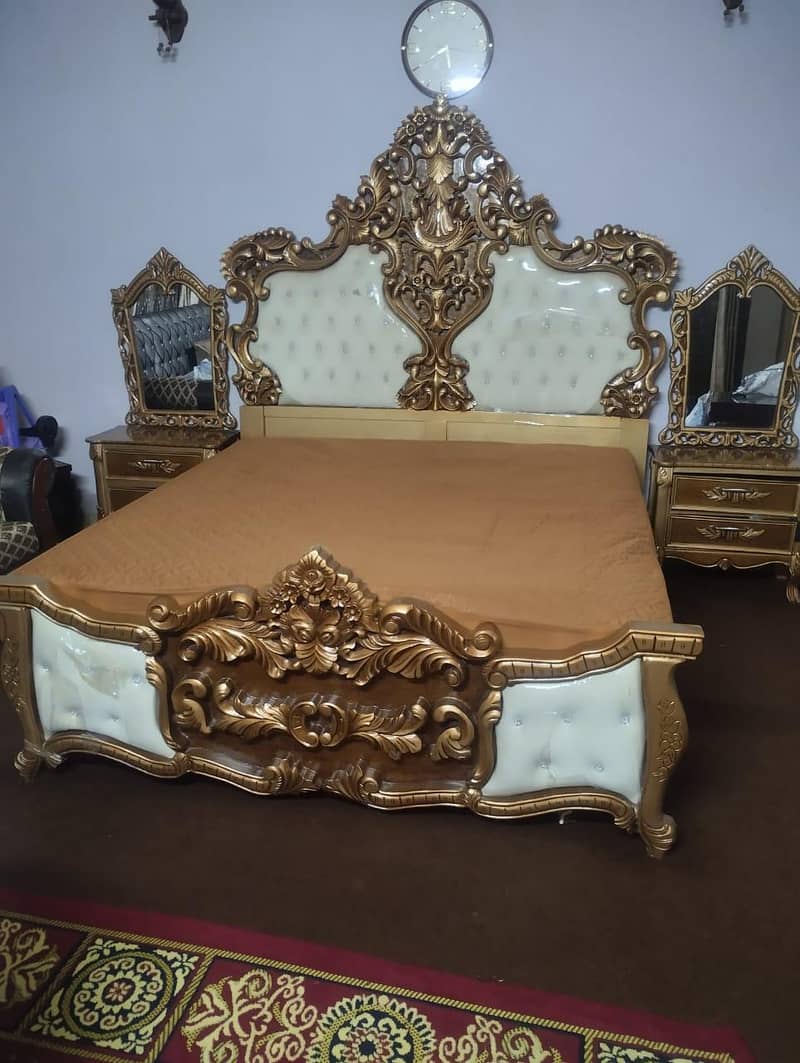 King Size Bed with 2 Chair table set and side tables. 3