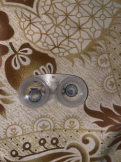 Contact lenses not used new in light blue colour not eyesight one f