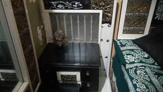 bed and dressing side tables