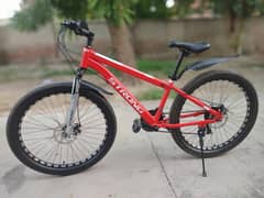 Sports Cycle 10 gears,disc brakes, shocks for sale.