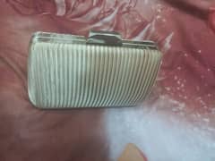 A Golden clutch for sale