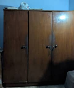 3 door wooden cupboard