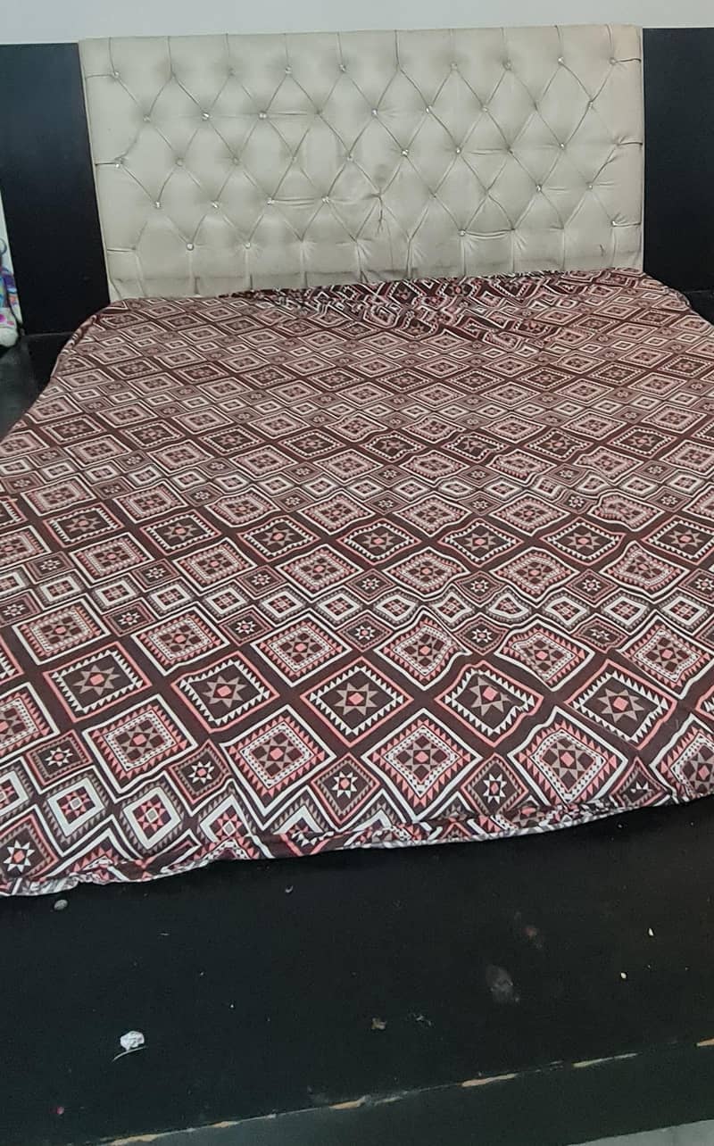 Bed with.   2 side tables 0
