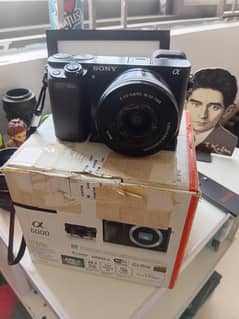 Sony a6000 with kit and box. low shutter count.