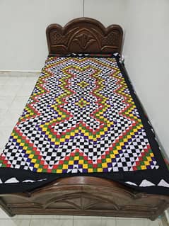2. single bed wooden made