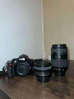 nikon dslr with tamron and 50mm lens