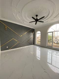 An Immaculate Family Sanctuary Discover This Brand New, Airy & Light-Filled 1-Kanal Full House with 5 Master Bedrooms, Spacious Lounges, Drawing Room, and Covered Parking for 4 Cars in State Life Block E