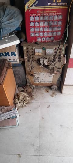 Multi purpose iron shelf/rack and battery charger