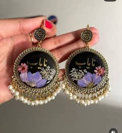 customize name earings.  handmade. . price 1600 delivery charges. . 300