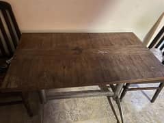 Wooden table used in okay condition