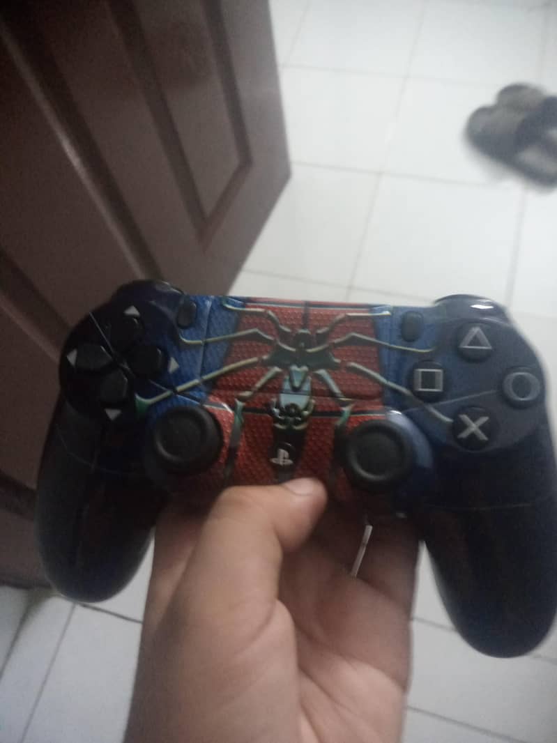 PS4 with skin controller  with 2 games 4