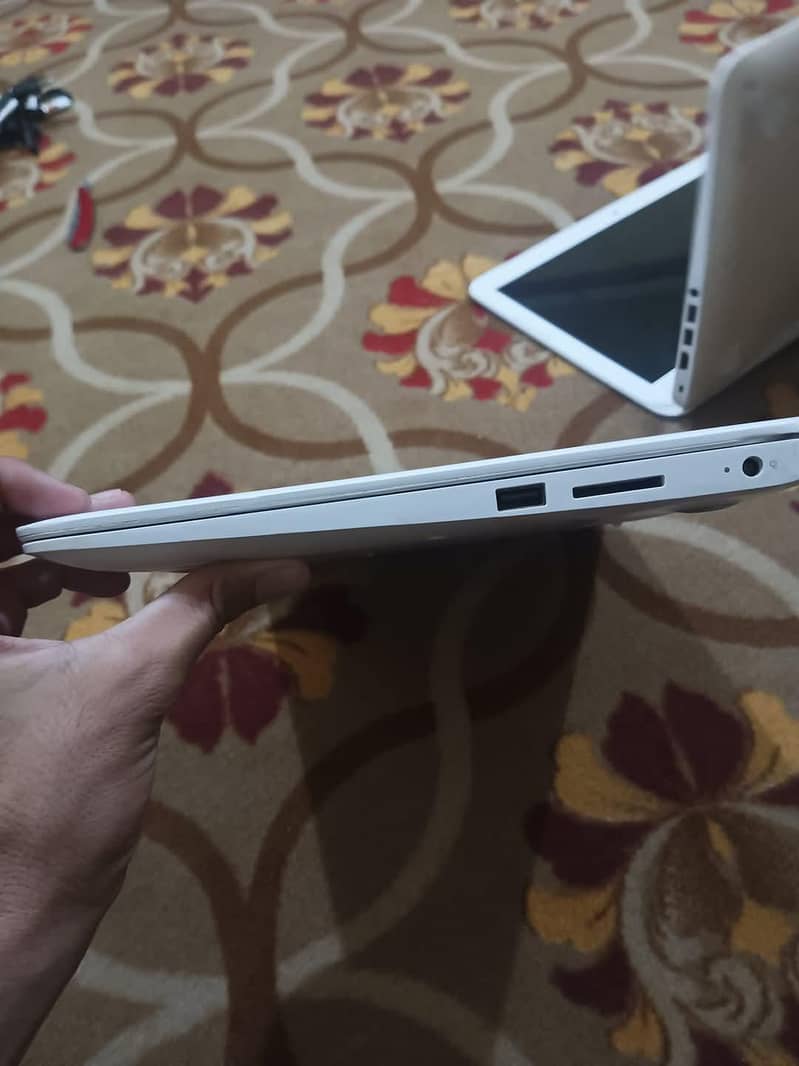 Hp White celeron 5th generation  Laptop  with window 10 installed. 6
