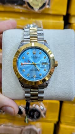 Rolex watch       Ap.     Or black Arabic aura