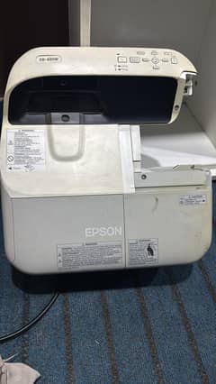 Epson EB485W projector Ultra short throw minimal shadows and glare.