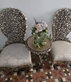 Carved wooden chairs