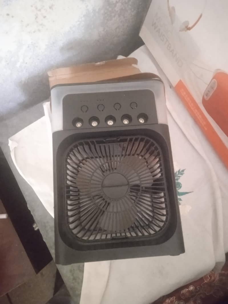 mini ac coller for sell in brand new condition with box 0