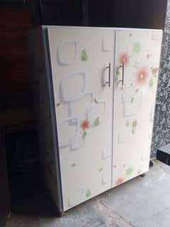 Double door mid size cabinet wheels attached for sale