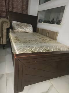 Single wooden bed