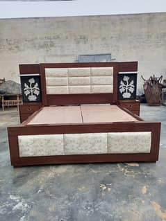 Wooden bed with side drawers