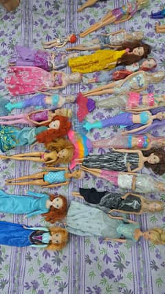 orignal barbie dolls and disney dolls