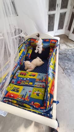 tinnies brand baby cot
