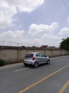 This car kia picanto looks like brand new