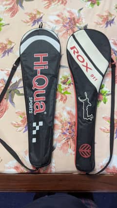 2 squash rackets and one ball for sale.