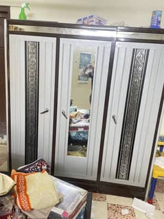 Iron bed and cupboard