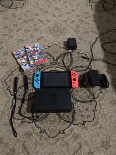 Nintendo switch v2 10/10 condition with additional games and case