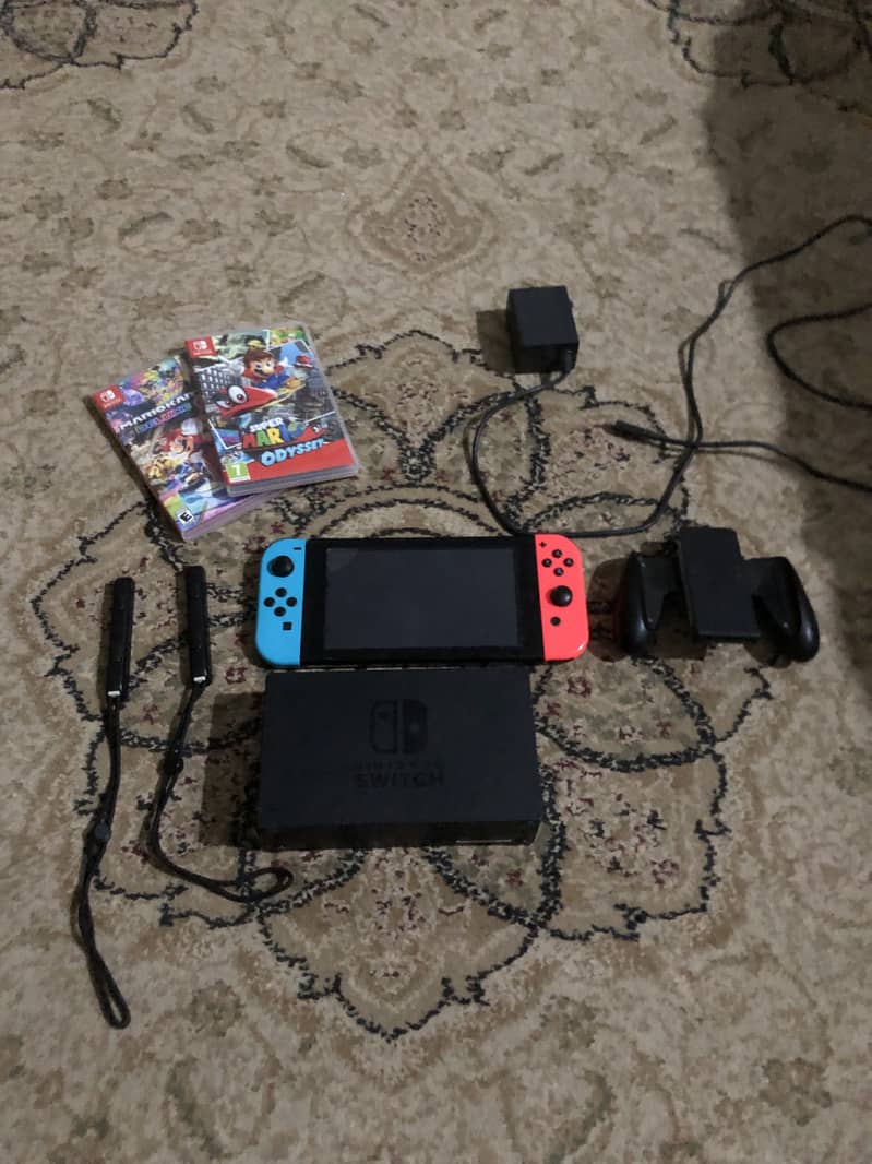 Nintendo switch v2 10/10 condition with additional games and case 0