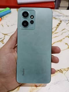 Redmi note 12 8gb ram ,128 rom with box and 33watt original charger