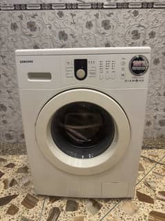 Samsung washing machine front door slightly use just like a new 6 kg