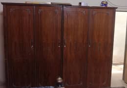 Bed with matress , 2 side tables , 4 door almari and dressing table