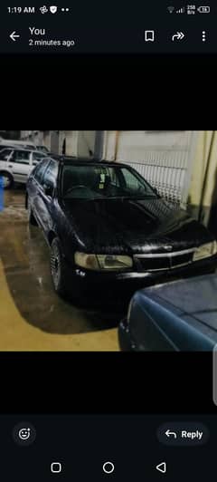 black Nissan sunny