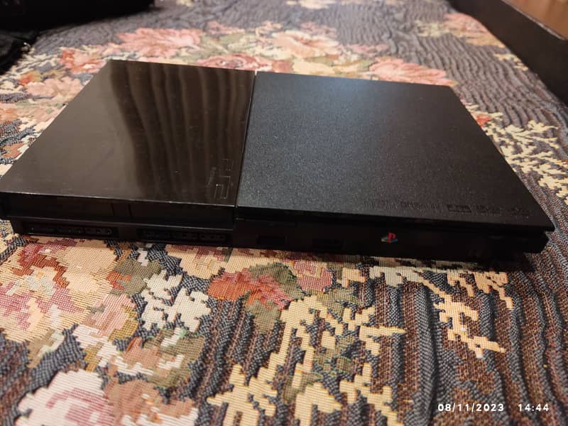 Playstation 2 (included: bag, 1 game, card, 1 controller, dany device) 4