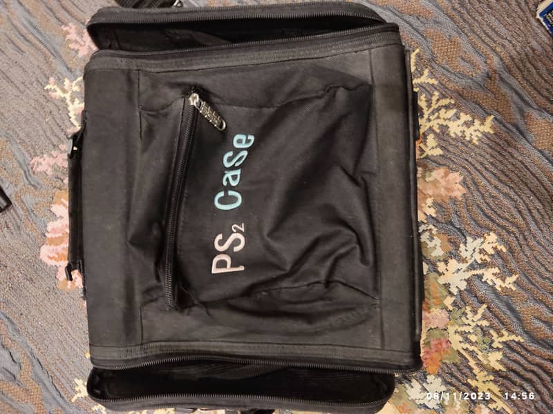 Playstation 2 (included: bag, 1 game, card, 1 controller, dany device) 13
