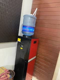 Lush condition water dispenser with 3 tabs and refrigerator in Red Col