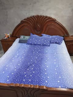 Bed with side tables and mattress