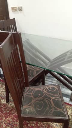 Dining Table with glass top and 6 chairs