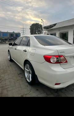 Toyota Corolla Gli 2014 model bumper to bumper +92 345 905612 four