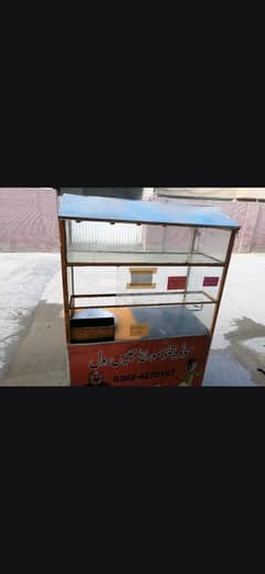 Burger shuwarma and fries roll samosa counter
