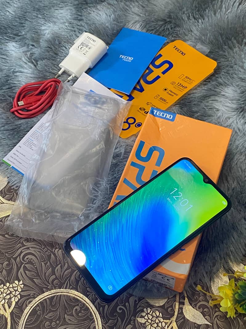 Tecno Spark 8c with box or original charger 1