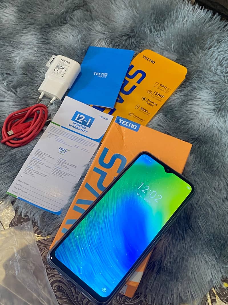 Tecno Spark 8c with box or original charger 15