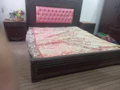 Bed with side tables