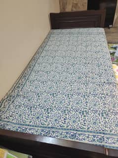 Single solid wooden bed