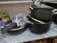 non stick set with 3 cooking pota in 3 sizes and one big fry pan with