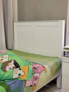 ikea design 2 single beds  with side tables for sale